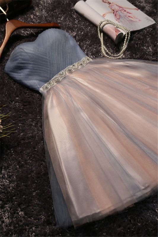 Atemberaubende trägerlose ärmellose A-Line Bow Lace Abendkleid