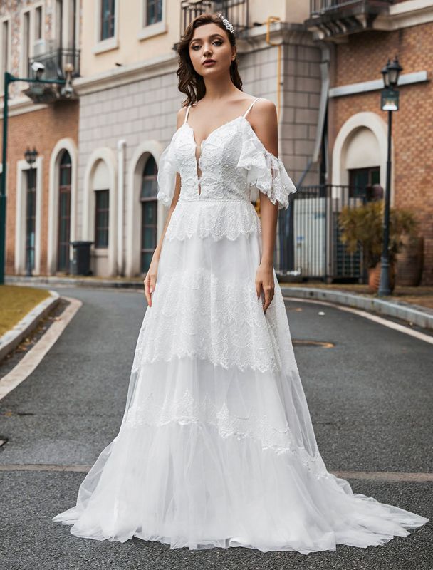 Robe de mariée bohème dentelle A-ligne col en V taille naturelle robe de mariée perlée
