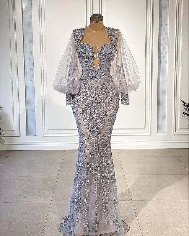 Impresionante vestido de noche de sirena con encaje de tul y mangas abullonadas