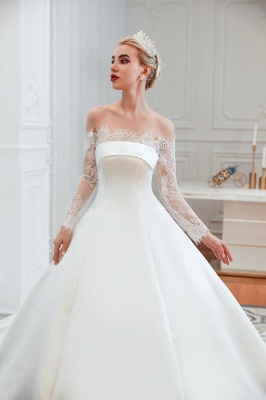 Hermoso vestido de novia sin tirantes de raso Aline con diseño de cordones de manga larga_12