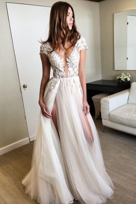 Robe de mariée en tulle fendue à manches longues et col en V profond avec des appliques_1