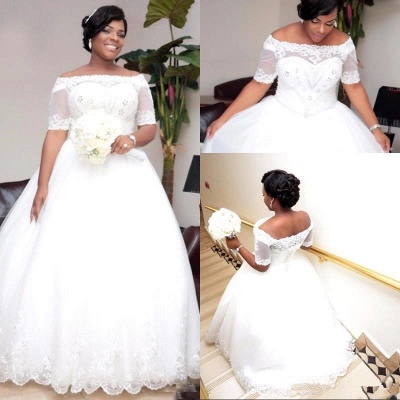 Robe de mariée modeste en dentelle blanche à manches mi-longues_4